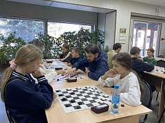 Романовские школьники приняли участие в турнире по шашкам